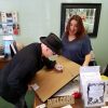 Artist Mark Lewis signing for Michele Sweet - Glendora Chamber Of Commerce